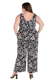 Chic Versatility: Black & White Patterned Cross-Over Jumpsuit - Plus