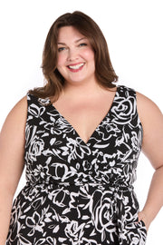 Chic Versatility: Black & White Patterned Cross-Over Jumpsuit - Plus