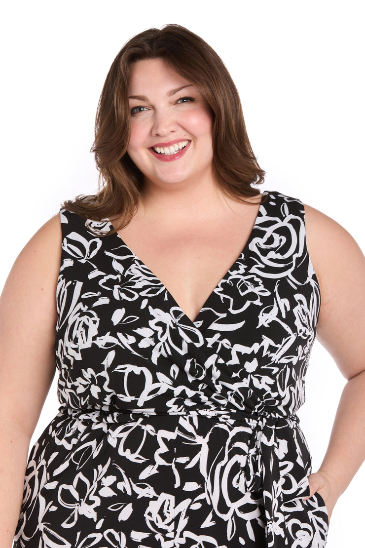 Chic Versatility: Black & White Patterned Cross-Over Jumpsuit - Plus