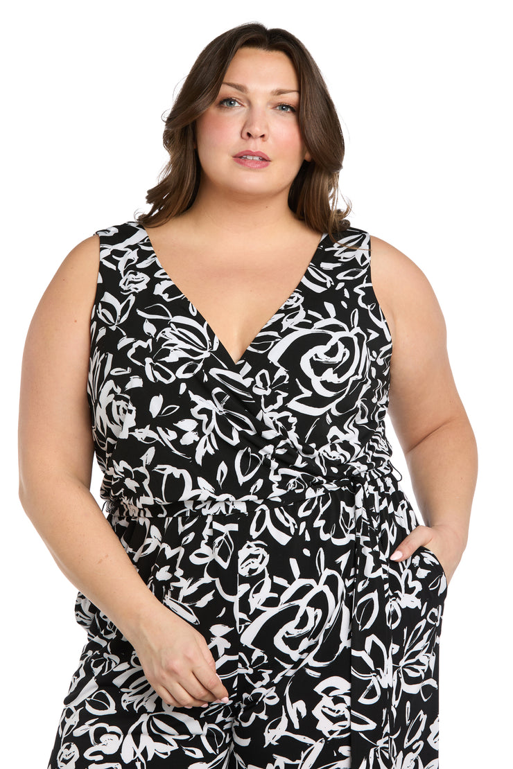 Chic Versatility: Black & White Patterned Cross-Over Jumpsuit - Plus